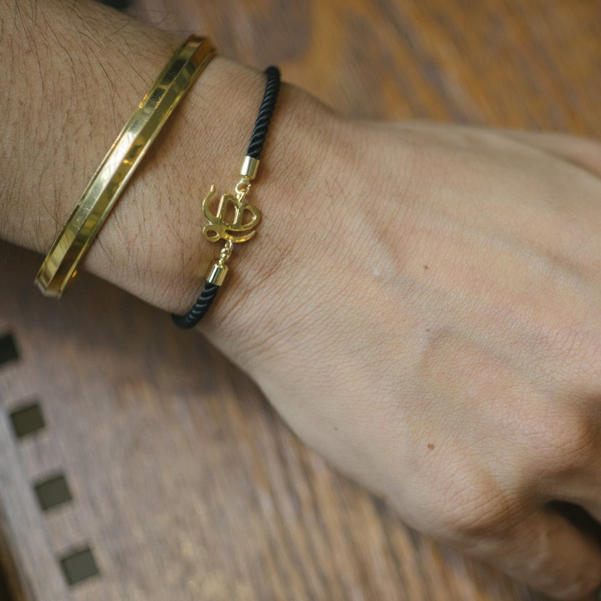 Men's Pure Silver Ek Onkar Black Rope Bracelet