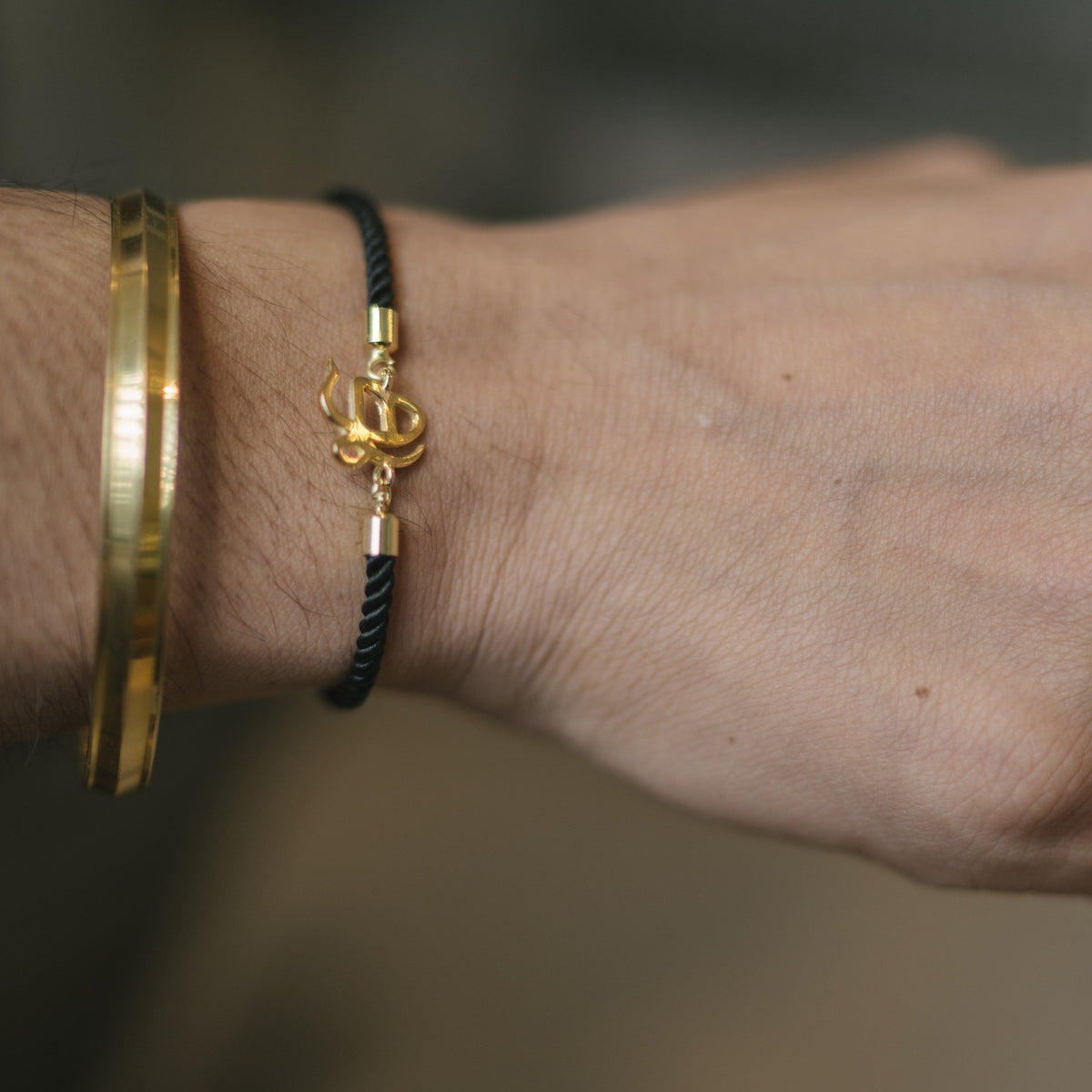 Men's Pure Silver Ek Onkar Black Rope Bracelet