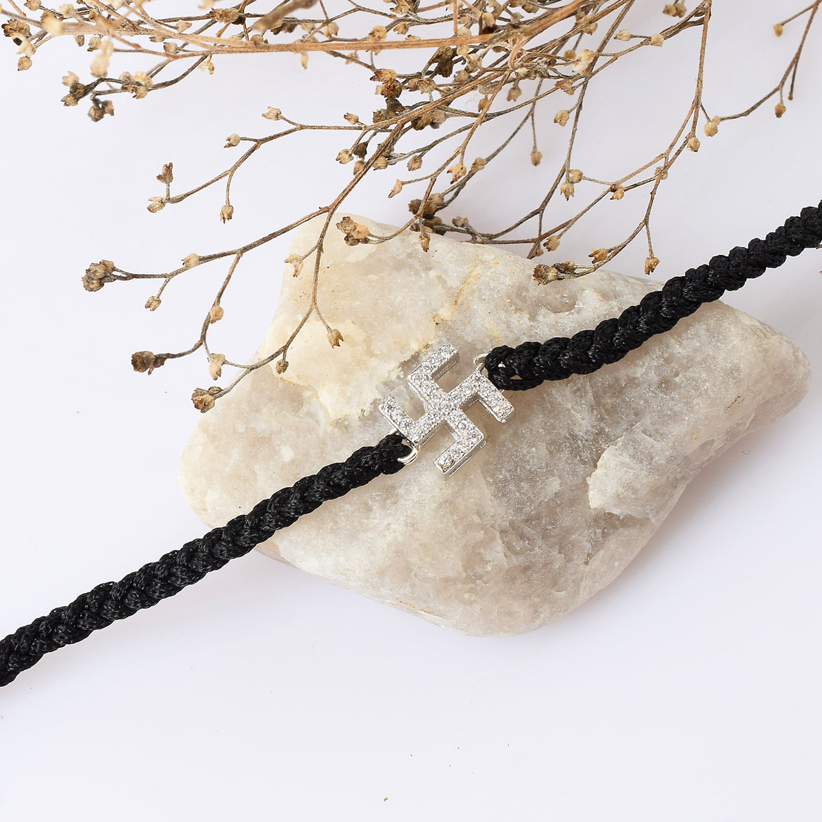 Swastik Black Thread Bracelet