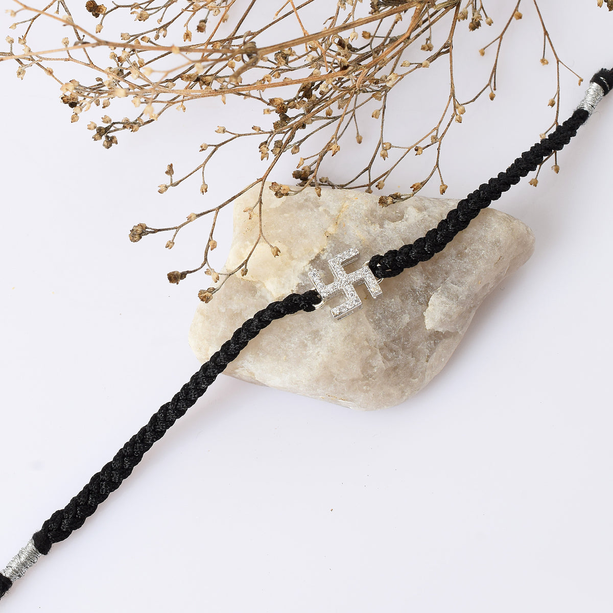 Swastik Black Thread Bracelet