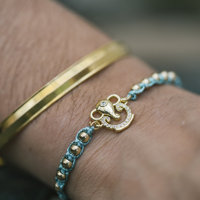 Gold Beaded Ganesha Blue Rope Bracelet