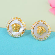 Empress Paris white and gold stud earrings