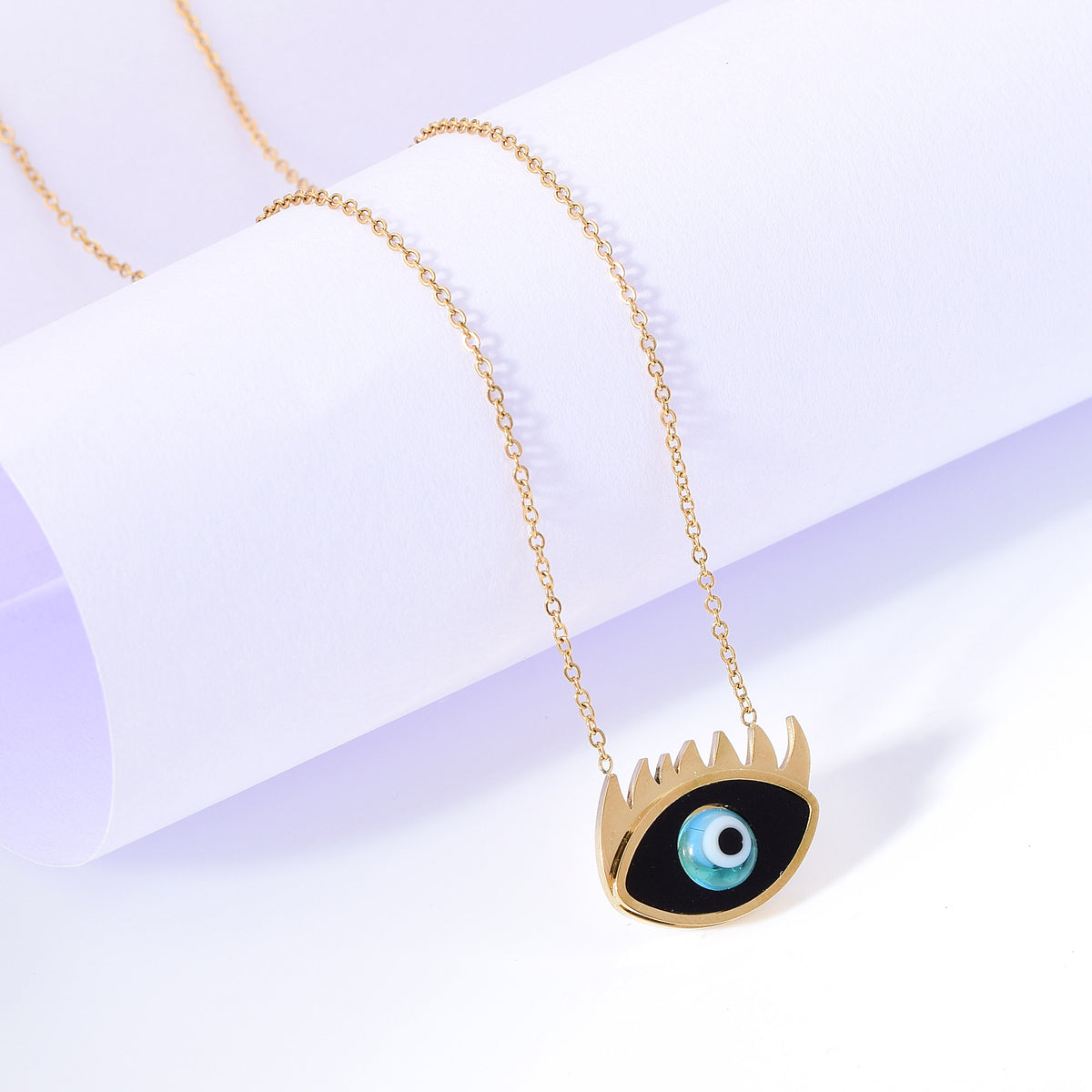 Black Eye Set of Necklace And Bracelet In Gold Finish