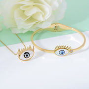 White Eye Set Of Necklace And Bracelet In Gold Finish
