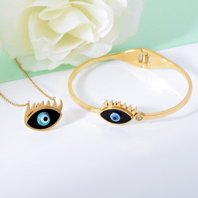 Black Eye Set of Necklace And Bracelet In Gold Finish